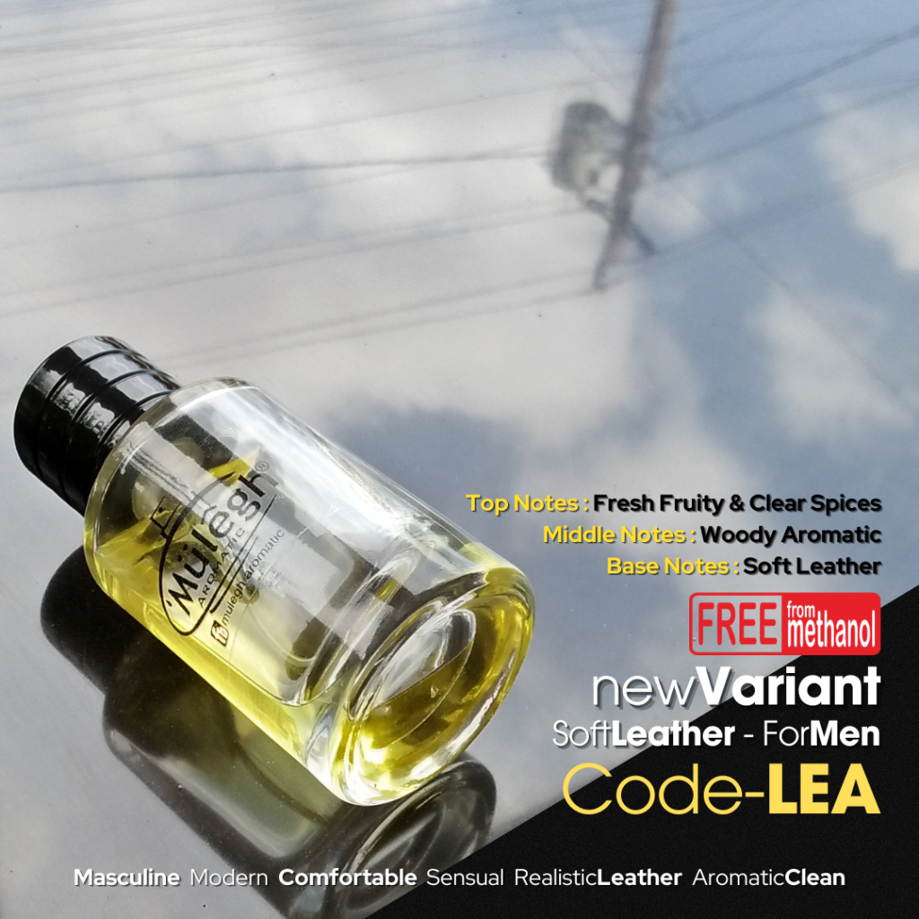 sebotol parfum tergeletak dilantai bercorak awan